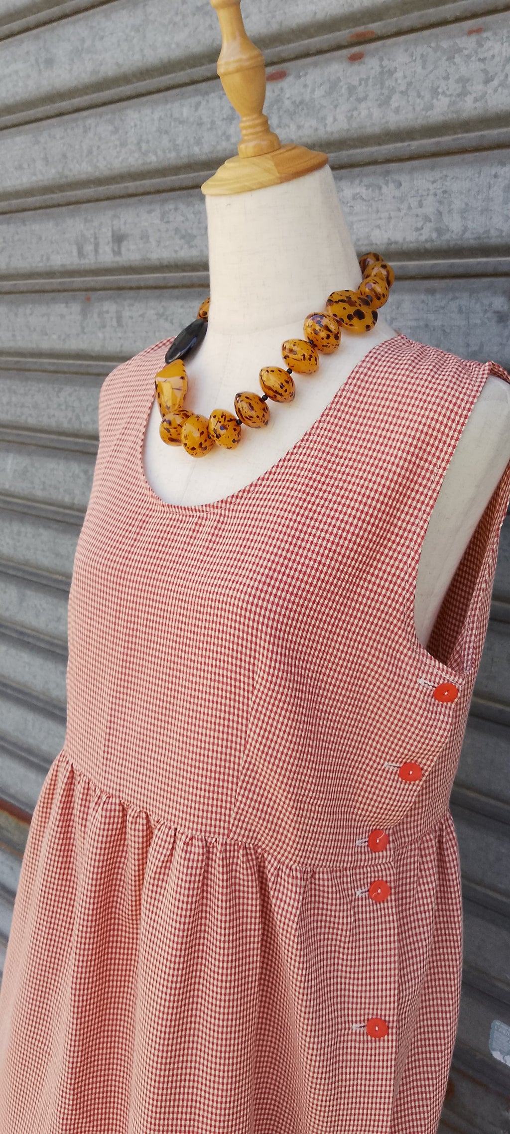 Vestito smanicato
