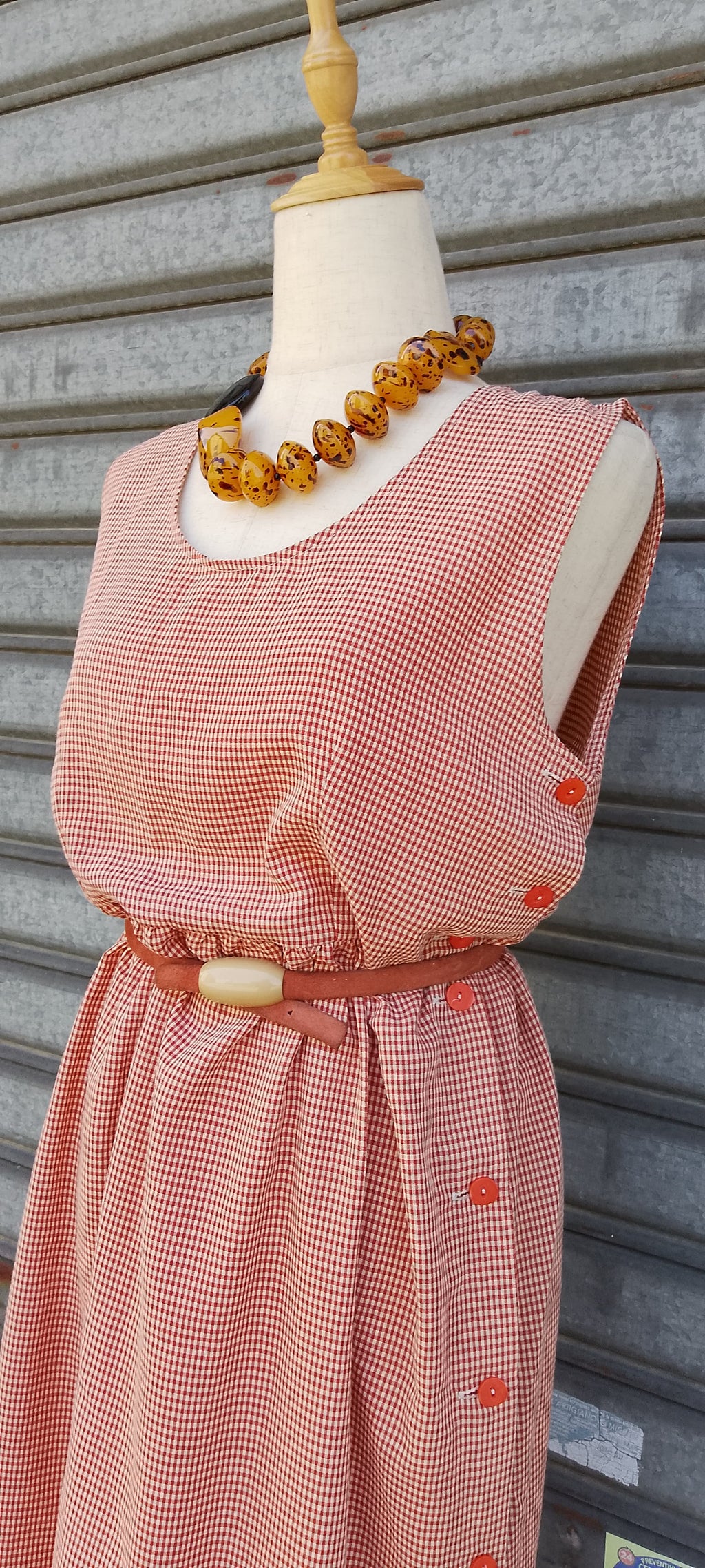Vestito smanicato